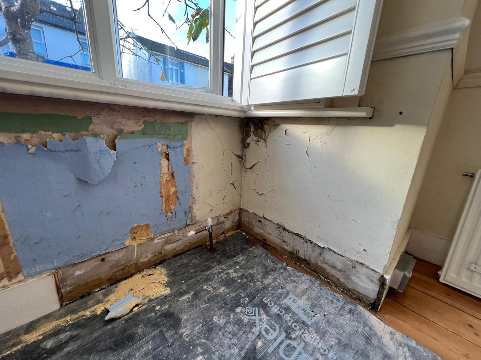 image of bay window after Surrey Hills damp proof treatment